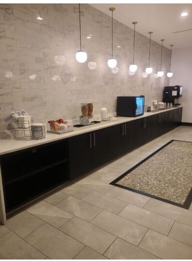 Hotel breakfast area commercial cabinets and service countertop